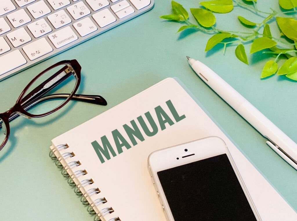 manual notebook and phone