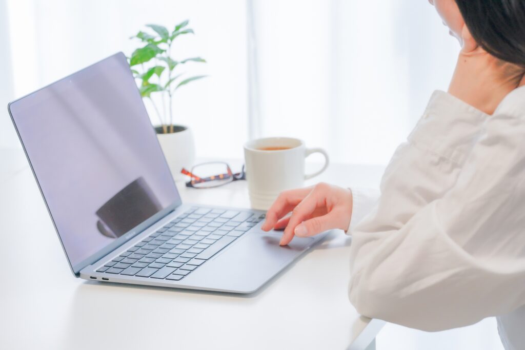 woman looking at computer screen black